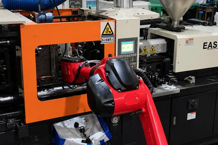 In-Mold Hardware Insert Loading for Injection Molding
